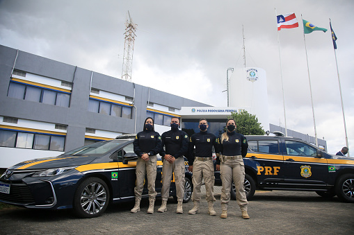 salvador, bahia, brazil - january 21, 2022: Federal Highway Police officers next to a vehicle at the regional superintendence in the city of Salvador.