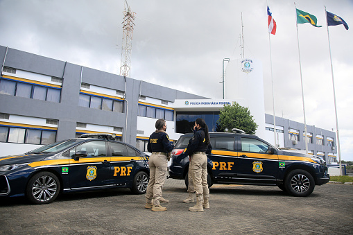 salvador, bahia, brazil - january 21, 2022: Federal Highway Police officers next to a vehicle at the regional superintendence in the city of Salvador.