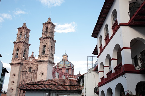 Santa Prisca Church in Taxco.  Taxco is a picturesque colonial town in Mexico. It is famous for its beautiful colonial architecture, narrow streets and silver products.Taxco is also called silver city.