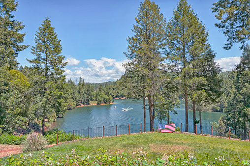 In the mountains of Northern California 
there are many lakes that offer entertainment for water sports, boating, fishing, a wide variety of opportunities and on this May day under a cloudy sky it was a perfect day for boating.