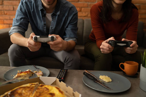 istock Gamers couple competing 1366278483