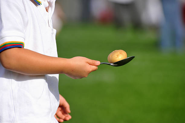 Race Stock Photo - Download Image Now - Egg And Spoon Race, Raw Potato,  Sports Race - iStock
