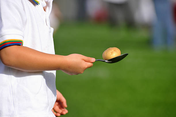Race Stock Photo - Download Image Now - Egg And Spoon Race, Raw Potato, Sports Race - iStock Race Stock Photo - Download Image Now - Egg And Spoon Race, Raw Potato, Sports Race - iStock