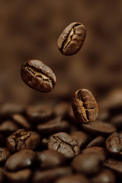 istock Macro Photo of Coffee Beans on Dark Background 1366281120