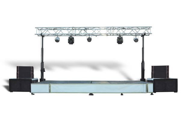 istock Stage with light equipment and audio sound speakers isolated over white 1366281714