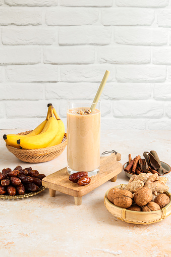 Date Banana Smoothie with fresh fruits and nuts for Ramadan Iftar breakfast