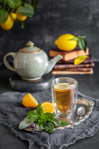 Freshly brewed herbal tea with mint, sage, thyme, lemon and honey