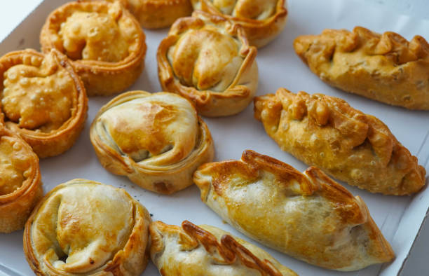 istock Several South American empanadas filled with meat and chicken 1366286144