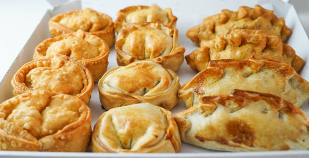 istock Several South American empanadas filled with meat and chicken 1366286161