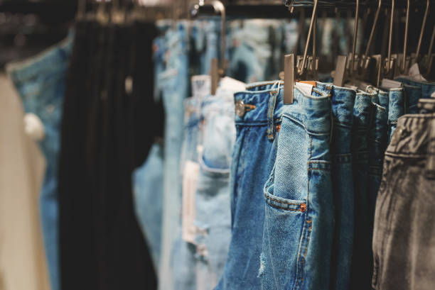 istock Rack with jeans in clothing store. 1366287417