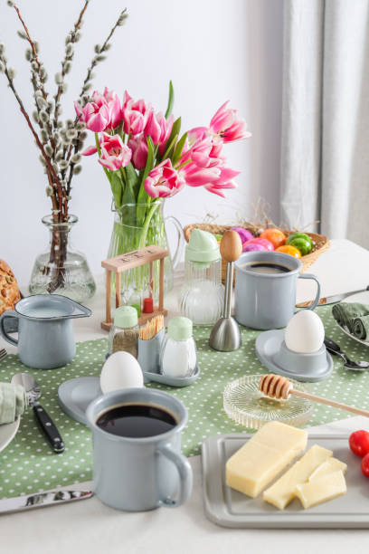 istock Sunday breakfast table setting with eggs, coffee, butter and bread in Germany 1366287898