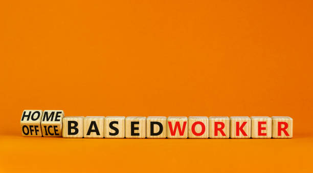 istock Home or office based worker symbol. Turned cubes and changed words 'office based worker' to 'home based worker'. Beautiful orange background. Business, home or office working concept, copy space. 1366292695
