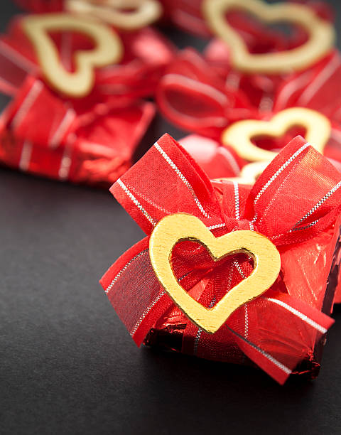 Chocolate in red foil stock photo