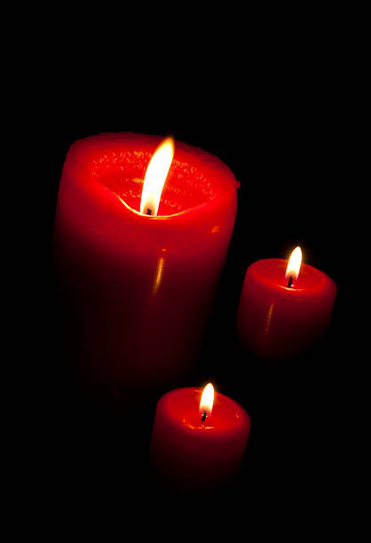 Three candles stock photo