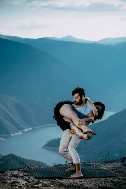 istock Muscular man practicing with an attractive colleague 1366296237