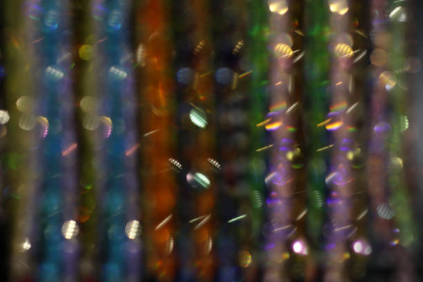 istock Abstract defocused multicolored background with shining glitter.Good as overlay layer. 1366296528