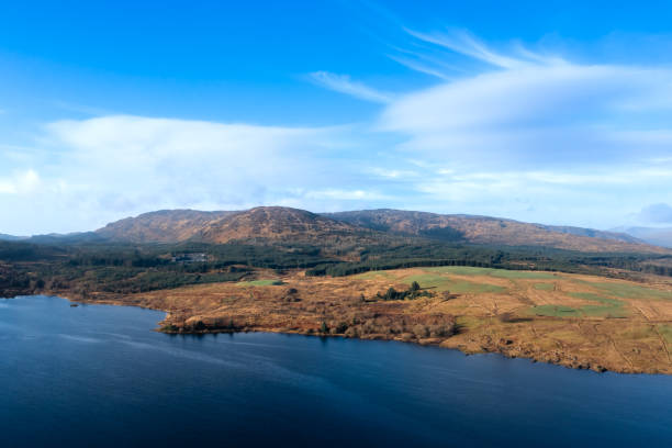 istock Scenic view across a Scottish lake on a winter day 1366296628