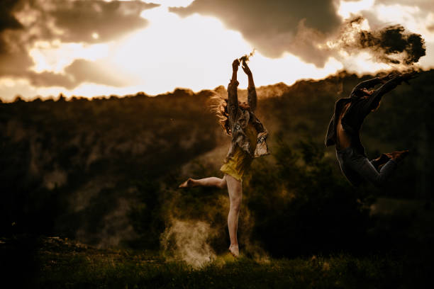 istock The young attractive modern ballet dancers on mountain hill 1366297803