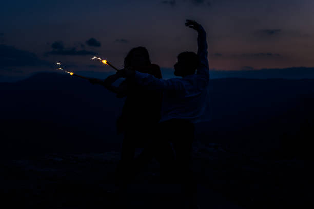 istock Young talented dancers practicing to the contest while holds sparklers 1366298909