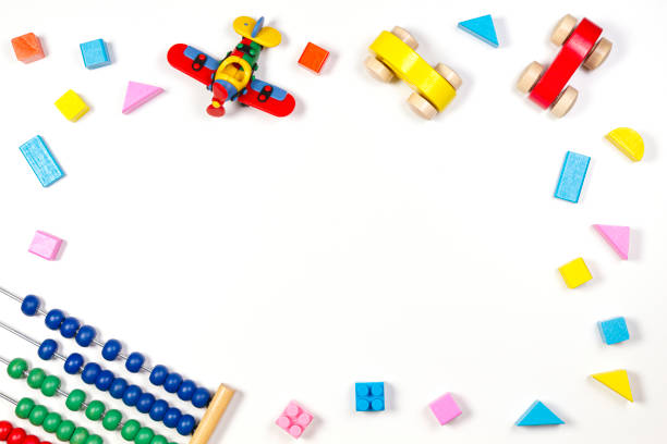 istock Baby kids toys frame on white background. Top view, flat lay. Copy space for text 1366299305