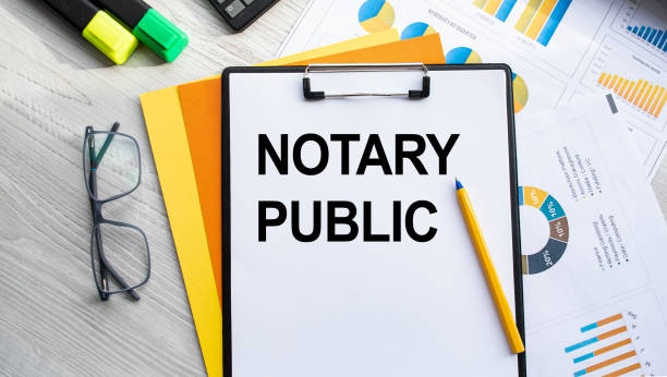 istock Notepad with the inscription NOTARY PUBLIC. Conceptual image, business accessories, calculator isolated on the desktop. Finance or business concept. 1366306867