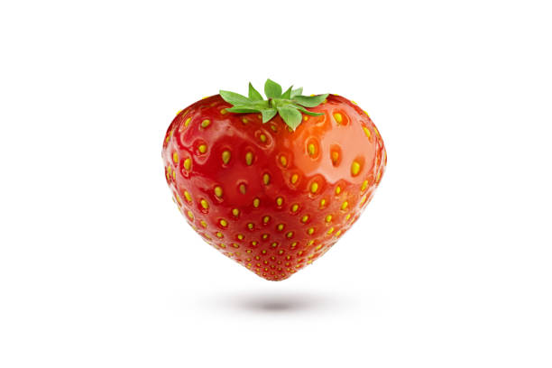 istock A heart shaped Strawberry isolated on a white background. 1366308984