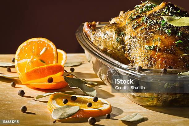 Turkey Roasted And Herbs Serve With Orange Fruit Stock Photo - Download Image Now - Roast Chicken, Animal Body Part, Animal Skin