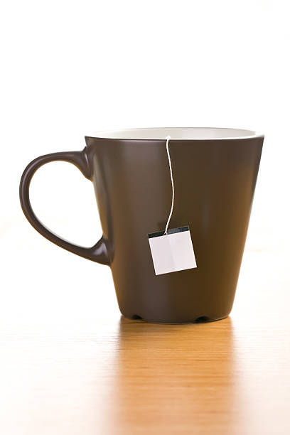 istock cup of tea with blank label 136631724