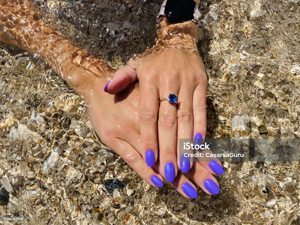 Summertime nail polish trendy color Fingernail Stock Photo