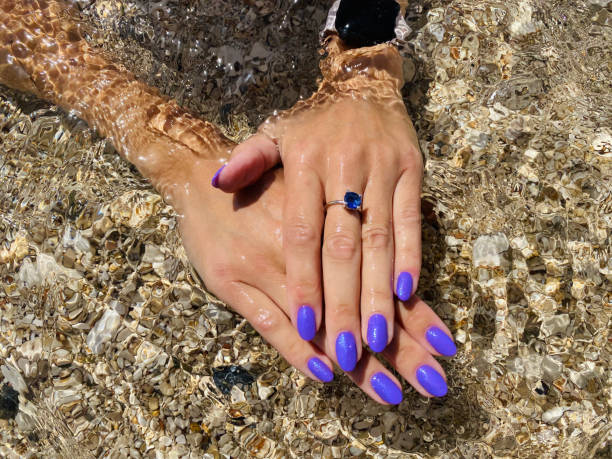 Summertime nail polish trendy color stock photo
