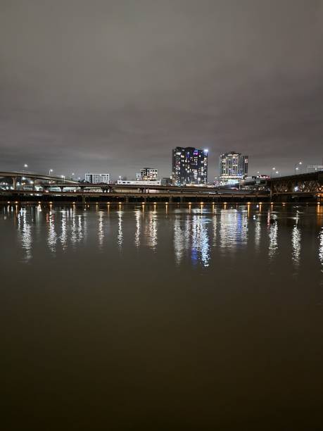 istock Portland City Skyline Reflected On The Waterfront At Night 1366325708
