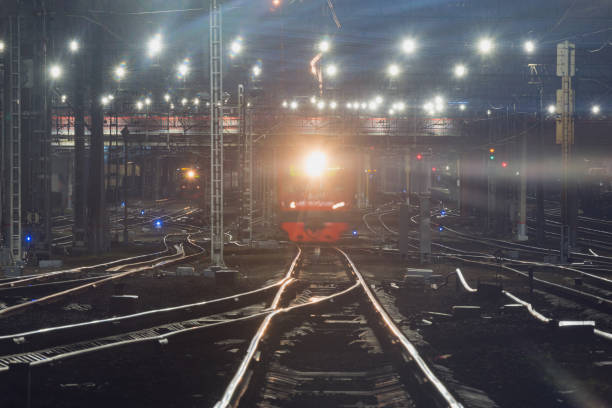 istock Passenger train moves fast at sunset time. 1366338068