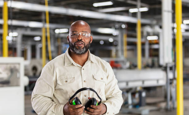 istock African-American man working in plastics factory 1366345353