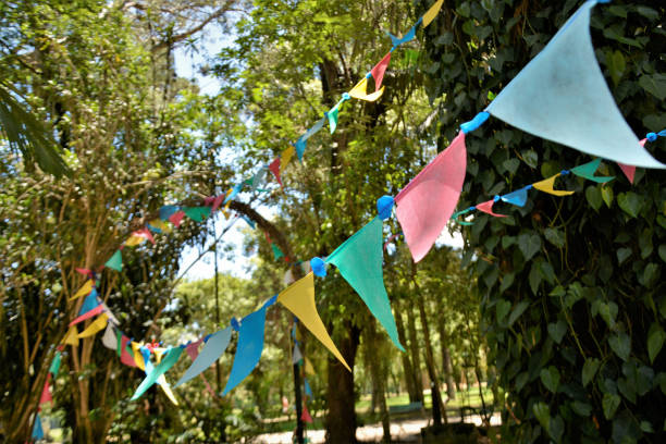 istock Colorful flags decorating public park 1366347723