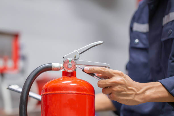 istock Engineer are checking and inspection a fire extinguishers tank in the fire control room for safety training and fire prevention. 1366350174