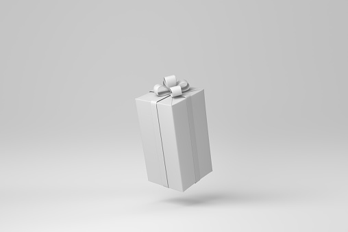 Gift box with ribbon on a white background. minimal concept. monochrome. 3D render.\