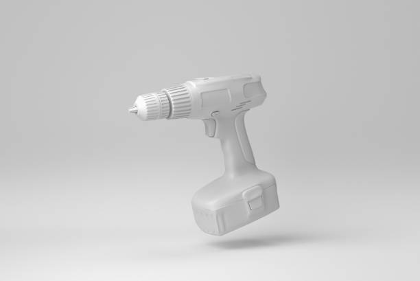 perceuse sans fil isolée sur fond blanc. concept minimal. monochrome. rendu 3d. - screwdriver isolated work tool clipping path photos et images de collection