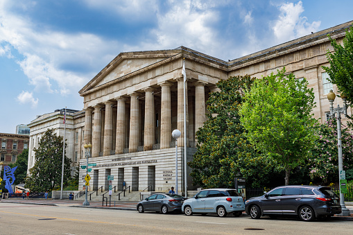 Washington DC - July 28, 2021: Exterior of the Smithsonian National Portrait Gallery and American Art Museum housed in a Greek Revival-style building in downtown Washington, DC, also known as the Old Patent Office Building