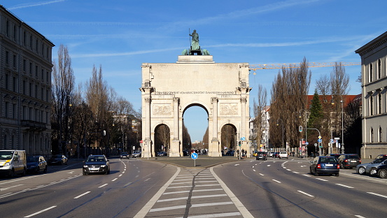 Siegestor, famous 19th-century triumphal arch featuring a bronze sculpture of Bavaria with 4 lions, southern facade, Munich, Germany