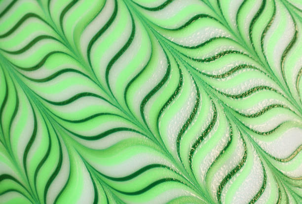 istock Stunning gradient green wavy pattern of a decorative doughnut for abstract backdrop 1366368980