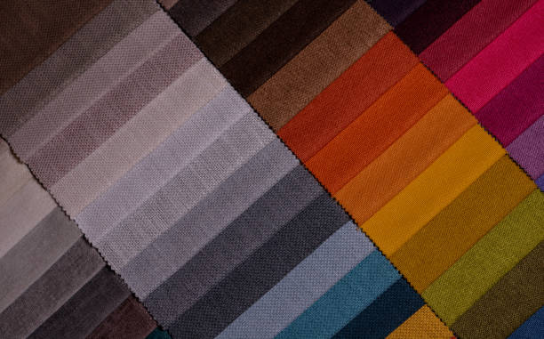 istock Samples of furniture fabrics.Multicolor fabric texture background. 1366370813