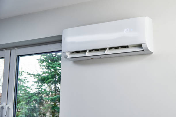 istock Air conditioner hanging on the wall, close up 1366371734