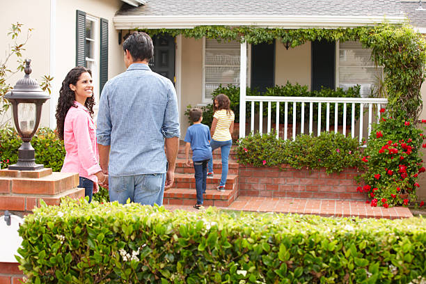 Hispanic family outside home