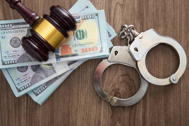 istock Concept for corruption, fraud and money laundry. Handcuff 1366372846