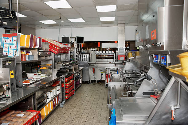 Fast food restaurant Commercial kitchen of a fast food restaurant fast food stock pictures, royalty-free photos & images