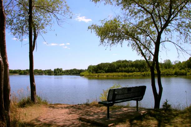istock Bench over Big Woods Lake, Cedar Falls, Iowa 2 1366375754