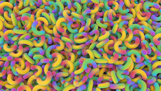 High resolution detailed 3D rendered abstract background with close-up texture of many multicolored rounded objects