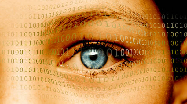 istock Eye with a blue pupil and digital digits 1366381170