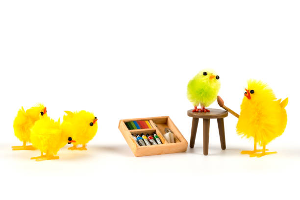 Easter Humor. Easter chicks paint each other with colors