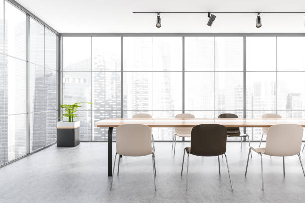 istock Bright office interior with panoramic window with Singapore city view 1366382237